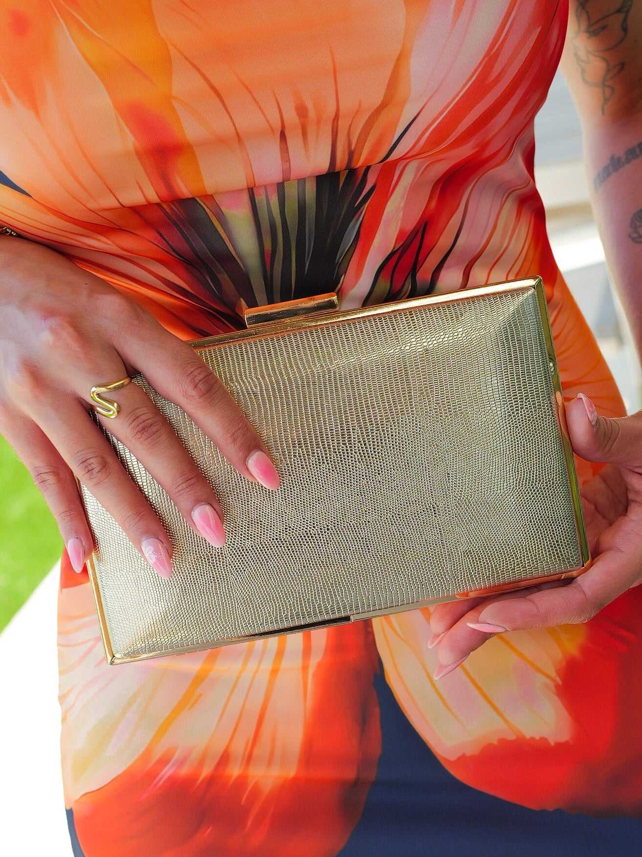 Golden textured clutch