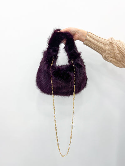 Purple fur handbag
