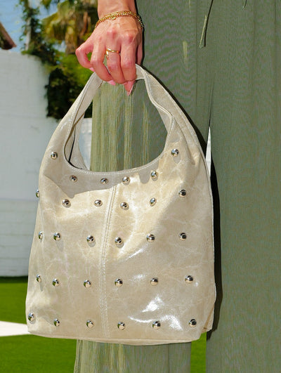 Beige studded shoulder bag