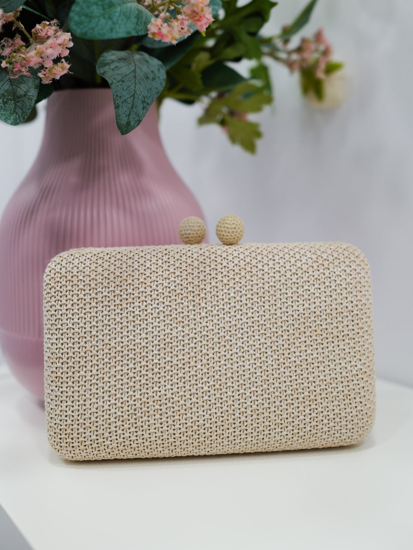 Beige raffia effect party clutch
