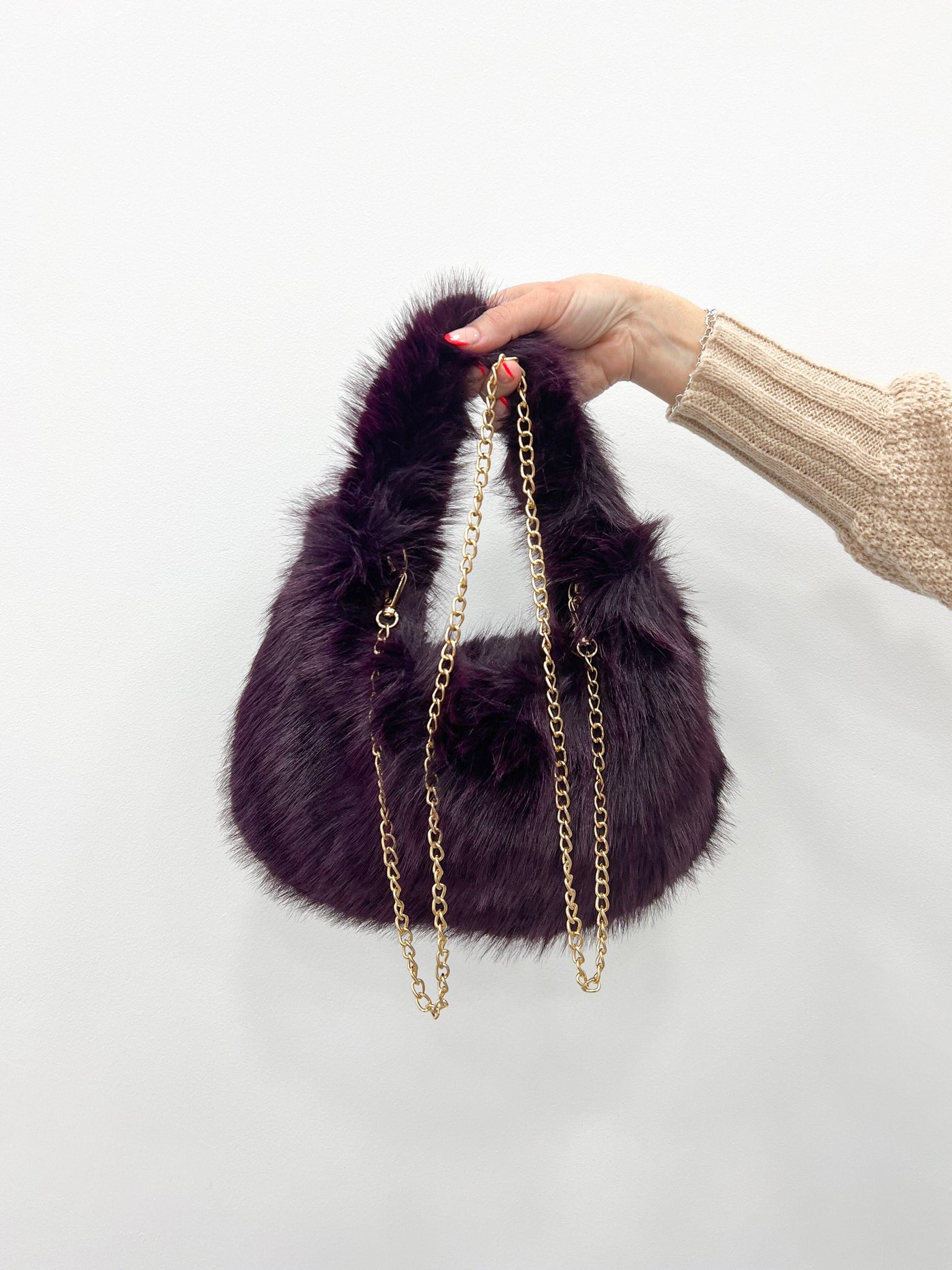 Purple fur handbag