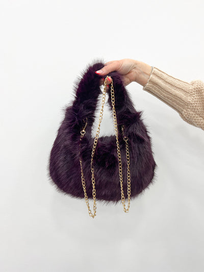 Purple fur handbag