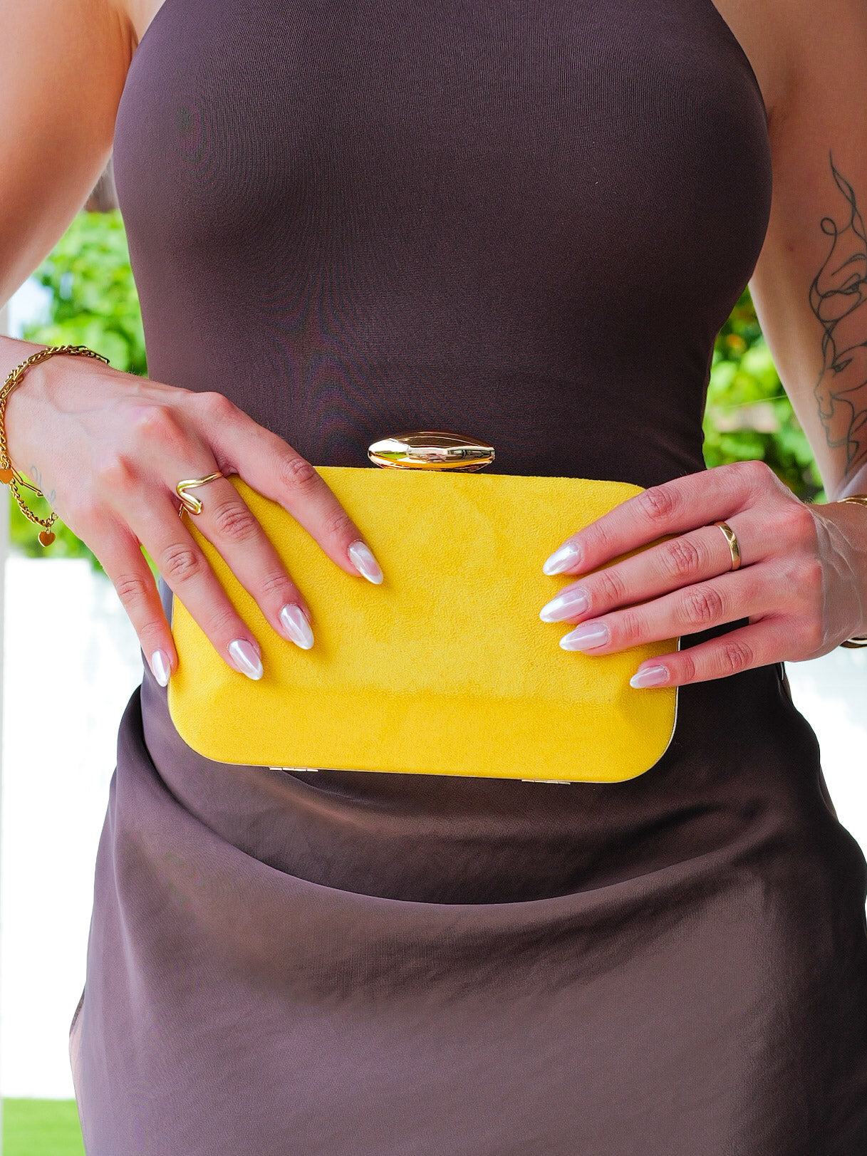 Yellow horizontal oval clutch