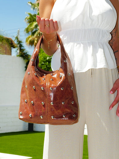 Brown studded shoulder bag