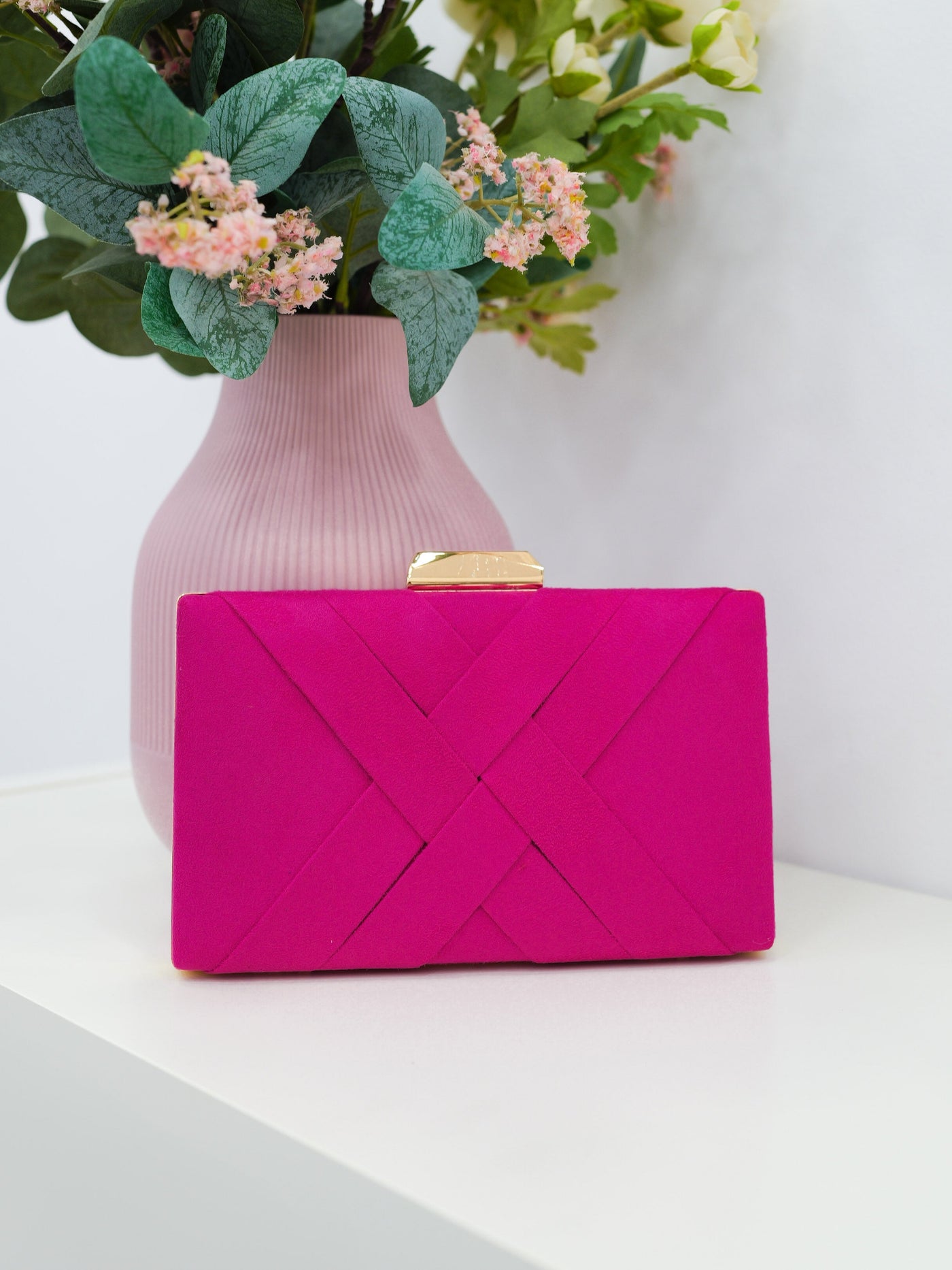 Fuchsia braided clutch
