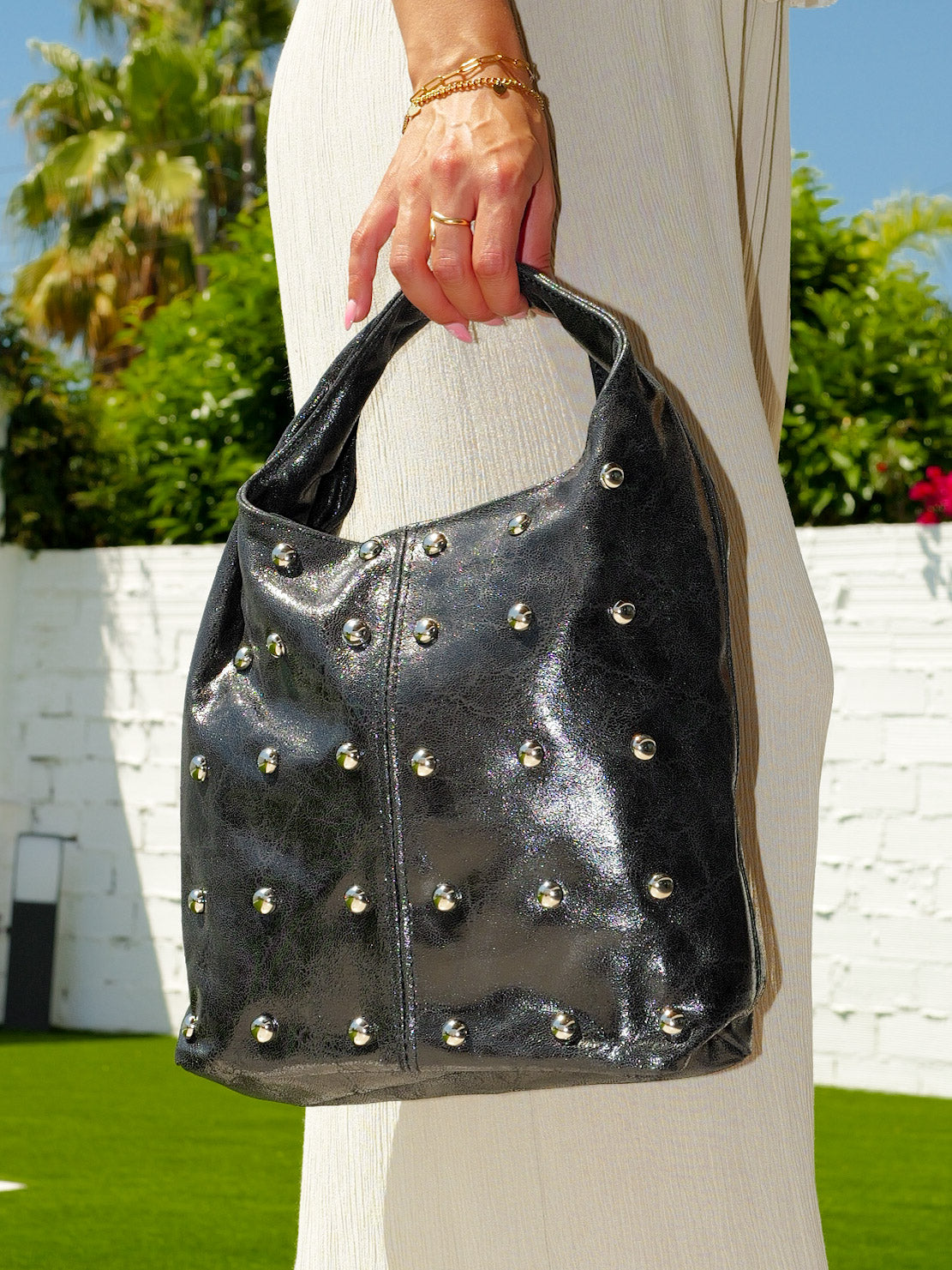 Black studded shoulder bag