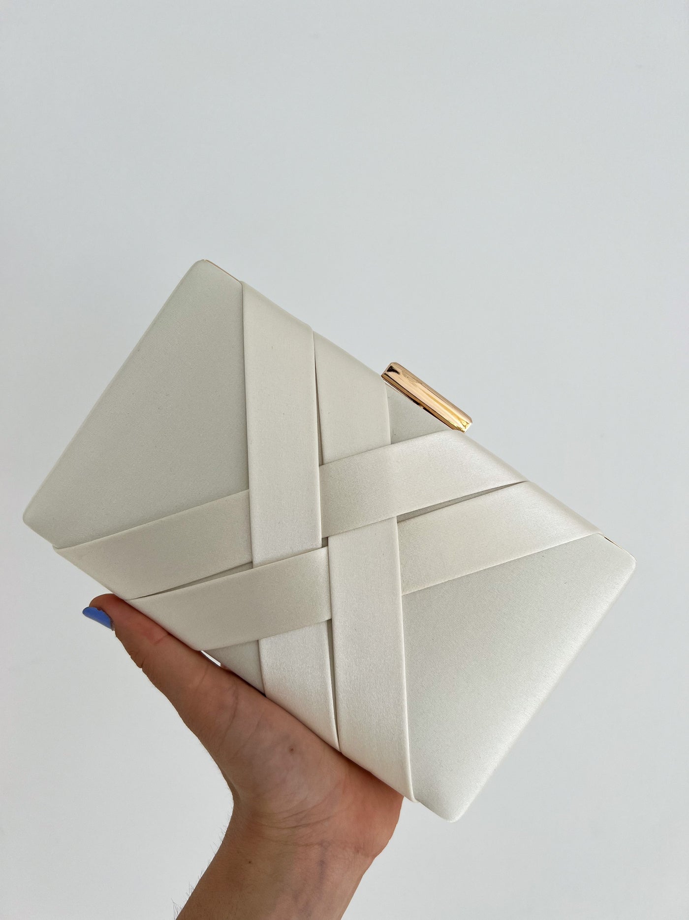 Cream satin clutch